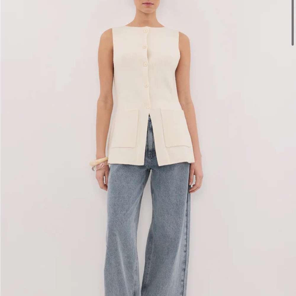 DISSH Sleeveless Cream Button-Up Top